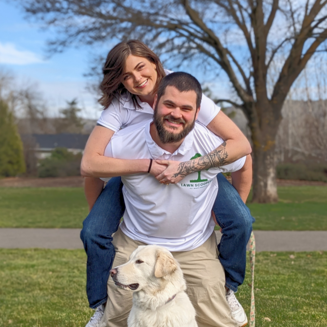 Tyler, owner of Lawn Scoopers, with a family member and dog, ready to clean your yard